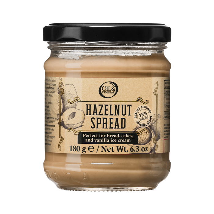 A jar of hazelnut spread with a label indicating it is perfect for bread, cakes, and vanilla ice cream. The weight is marked as 180g / Net Wt.