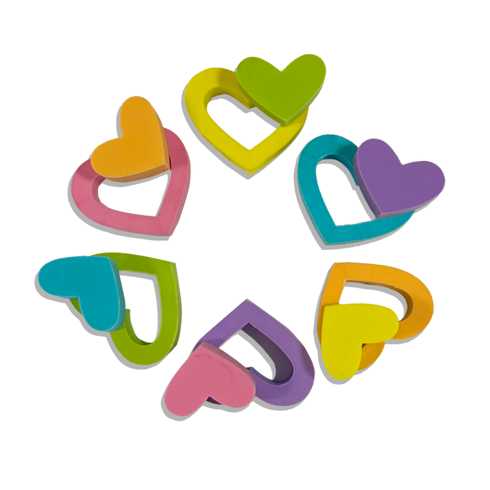 Six OOLY Hearts in Bloom Puzzle Erasers with the middles popped out on white background