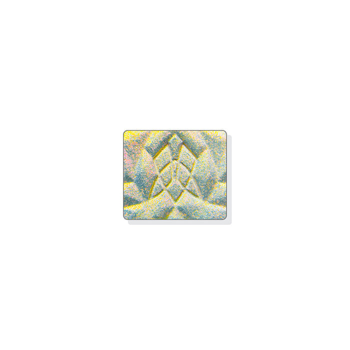 A single multichrome eyeshadow in colour Incandescence on a white background. Has a translucent white base that shifts bright red-orange-yellow-lime