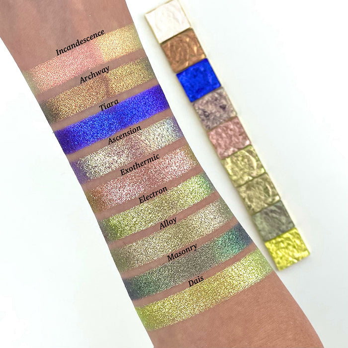 Arm swatches of Incandescence, Archway, Tiara, Ascension, Exothermic, Electron, Alloy, Masonry and Dais on fair skin tone, on a white background with single shadows lined up.