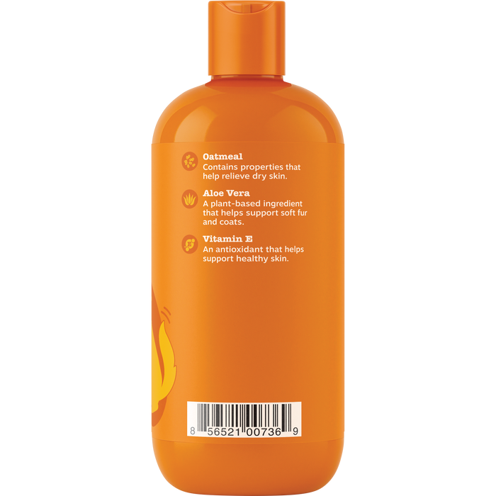 Orange dog shampoo bottle with orange cap and ingredient information on label.