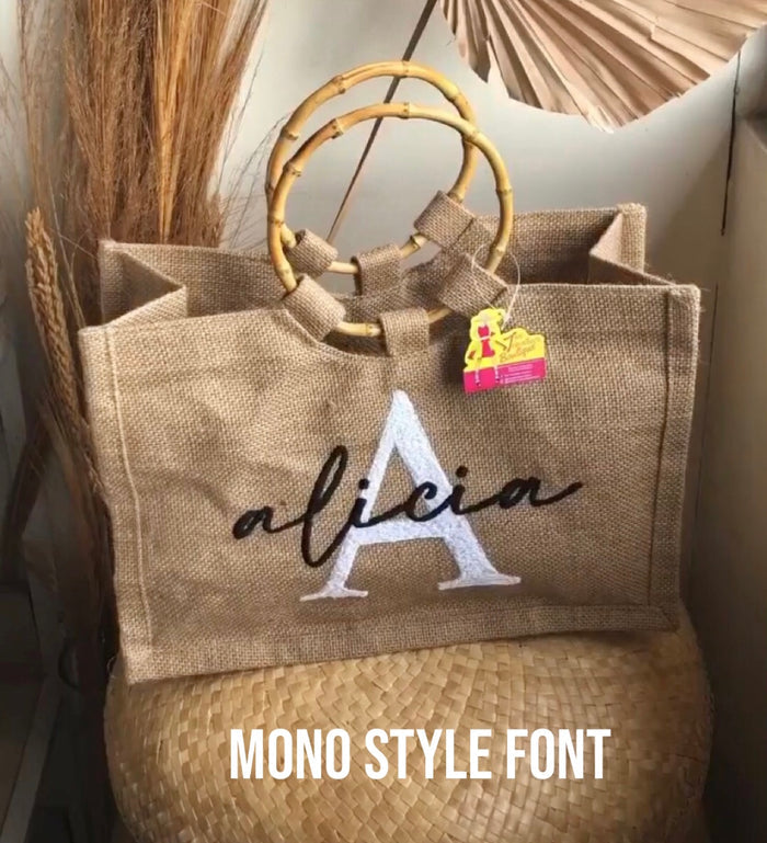 Natural jute tote bag with bamboo handles personalized with name Alicia in mono style font