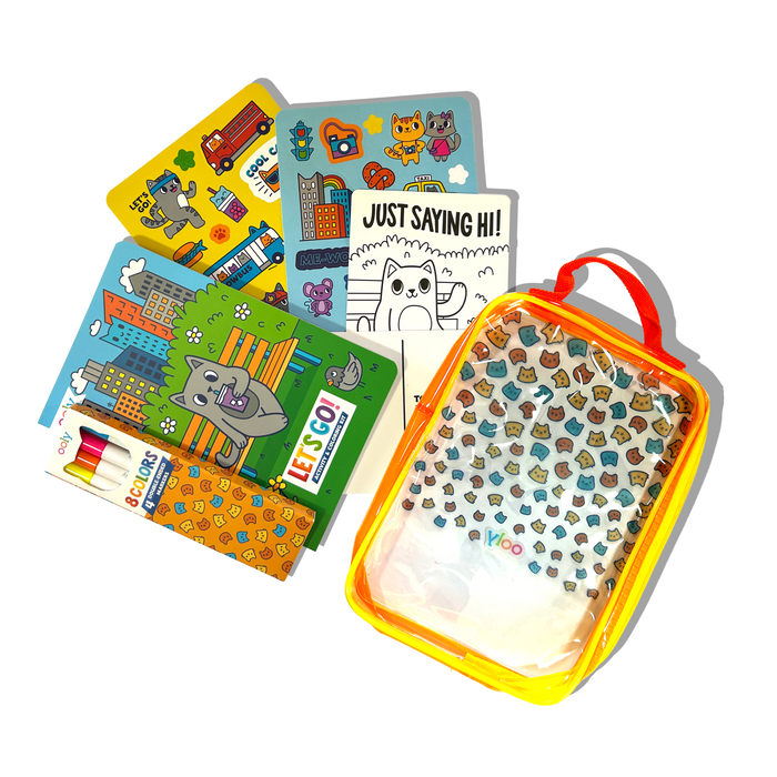 Carrying case and contents of OOLY Kitty in the City Let’s Go! Activity & Coloring Kit on a white background