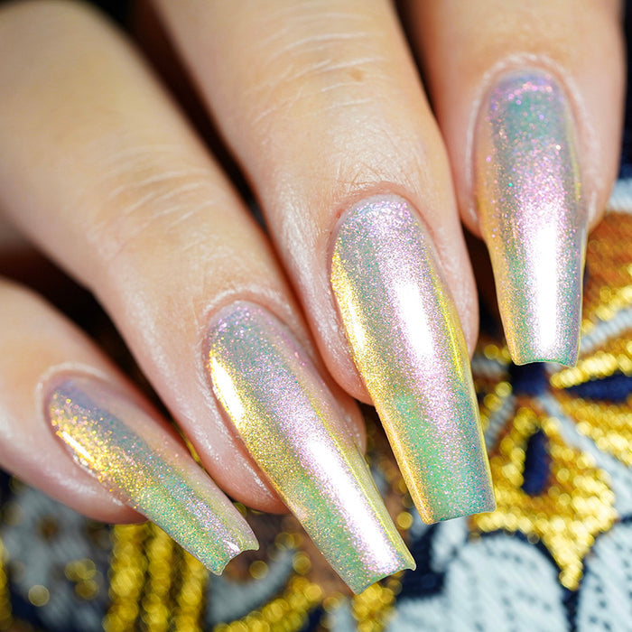 Close up shot of long nails done with Lightfast Nail Lacquer on fair skin tone.