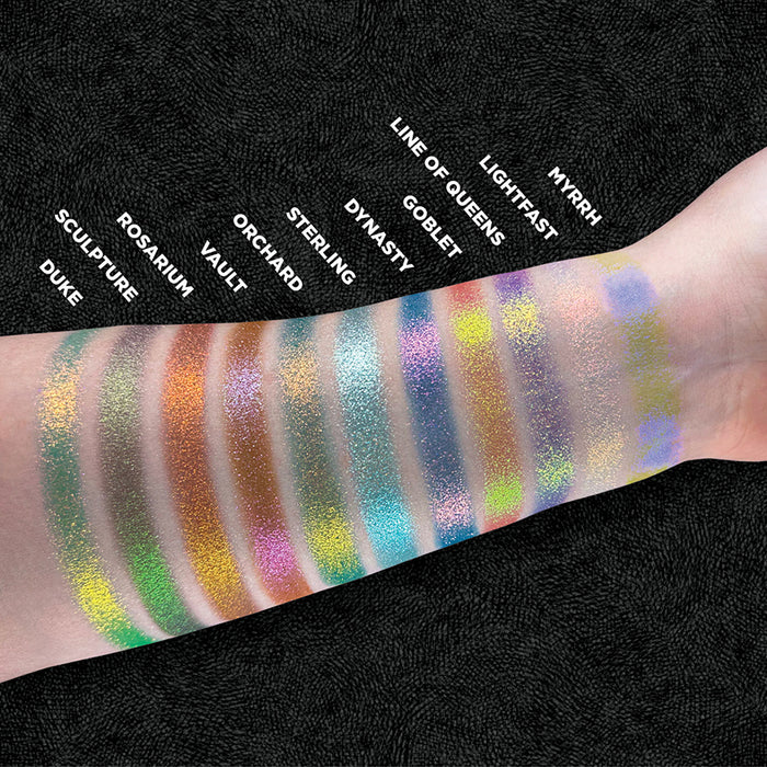 Top angled arm swatches of Line of Queens and the rest of the Holiday Expansion Bundle shades on fair skin tone.