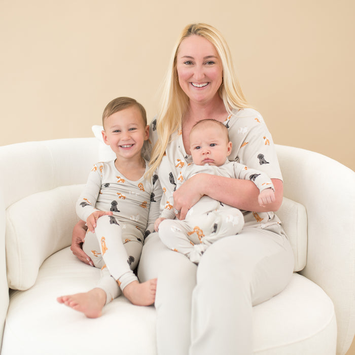 Family modeling Kyte Baby Fluffy Dog collection in matching apparel