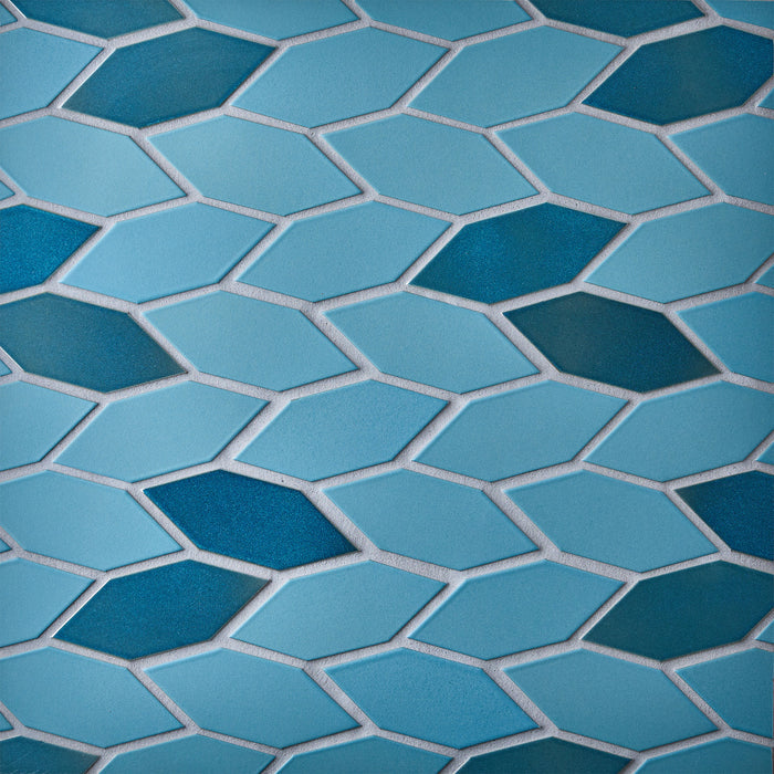 Caption: Classic Field Wide Hex in M76 Tahoe Blue & G21 Opal Pacific. Prism Dove Grey grout by Custom Building Products.