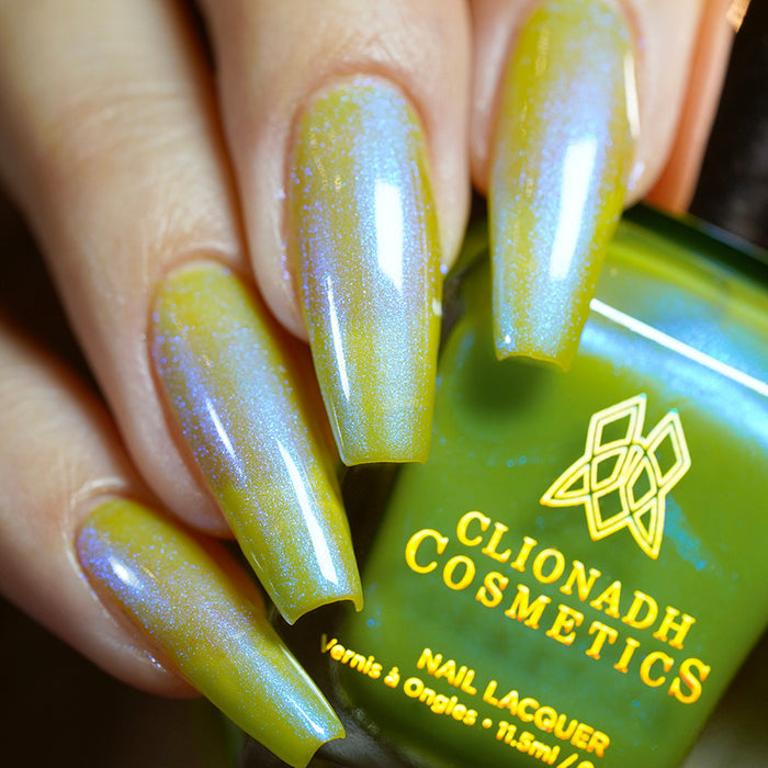 Close up shot of long nails done with Myrrh Nail Lacquer on fair skin tone.