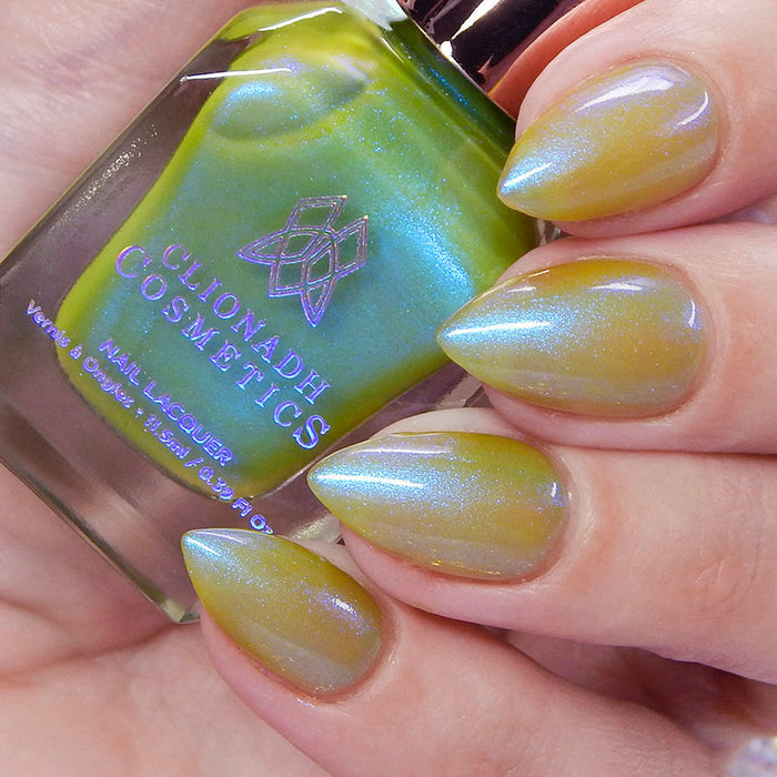 Close up shot of nails done with Myrrh Nail Lacquer on fair skin tone.