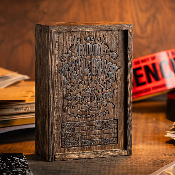 Wooden card box with engraved text on a wooden surface Sister Merry Gorda Odd Fellows Playing Cards by Stockholm 17