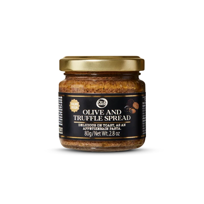 Jar of olive and truffle spread on a white background