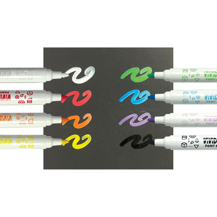 Row of markers with swatches on black paper from the OOLY Vivid Pop! Acrylic Paint Markers