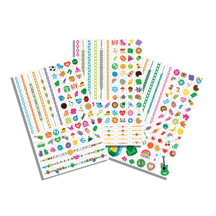 Three fanned out sheets of OOLY x Girl Scouts DIY Temporary Tattoo Jewelry
