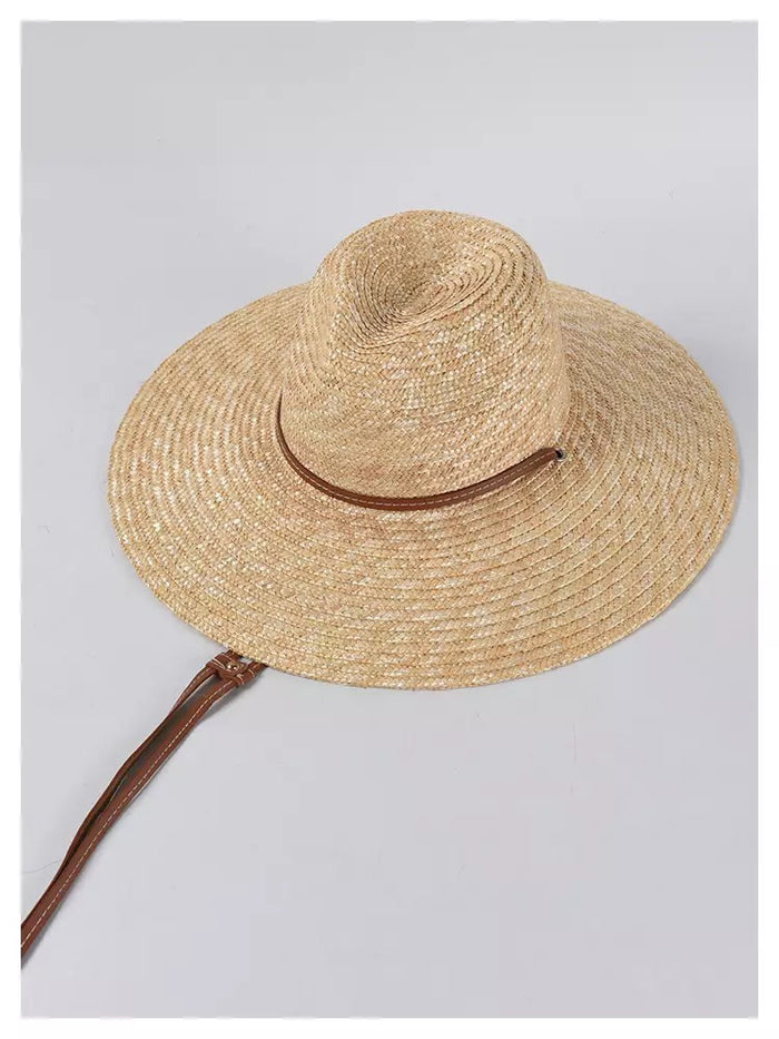 Travellers Hat Boutique panama wheat hat with wide brim and brown chin strap