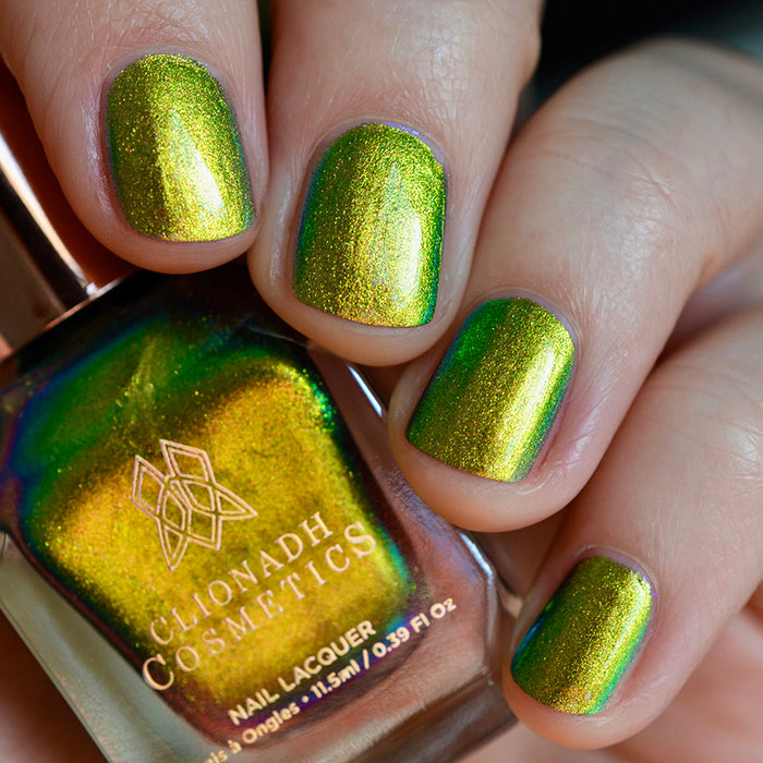 Close up shot of nails done with Patina Lite Nail Lacquer on fair skin tone.
