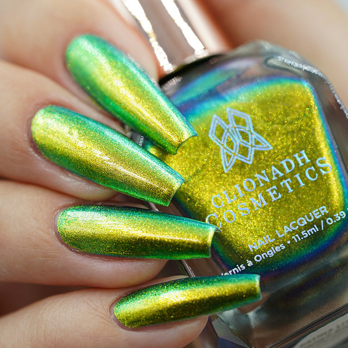 Close up shot of long nails done with Patina Lite Nail Lacquer on fair skin tone.