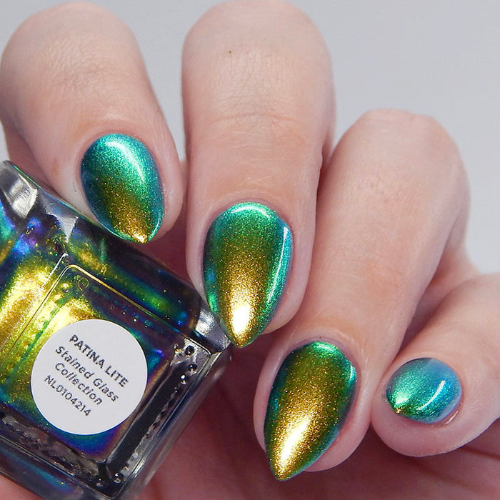 Close up shot of nails done with Patina Lite Nail Lacquer on fair skin tone.