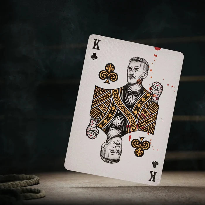 Peaky Blinders Playing card with a king of clubs design on a dark background