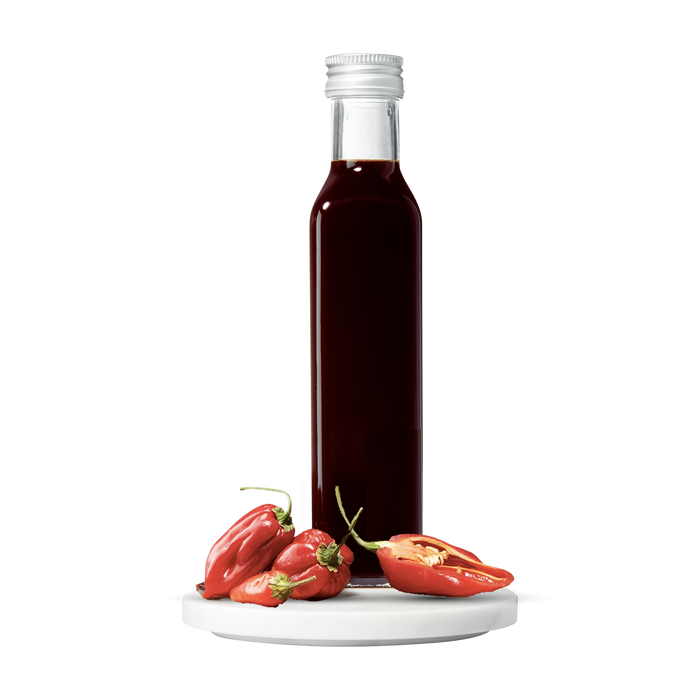 Bottle of balsamic with red peppers
