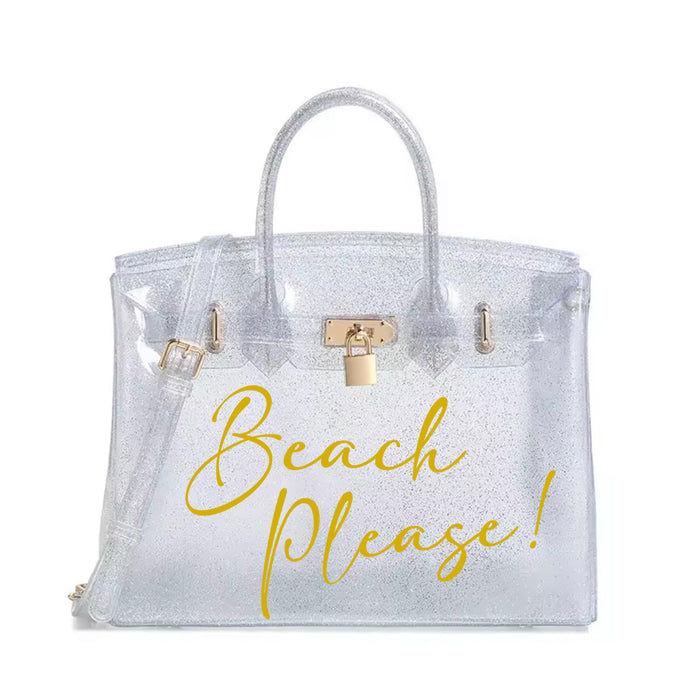 Clear personalized Beachkin tote bag with gold lock and yellow Beach Please text by Travellers Hat Boutique