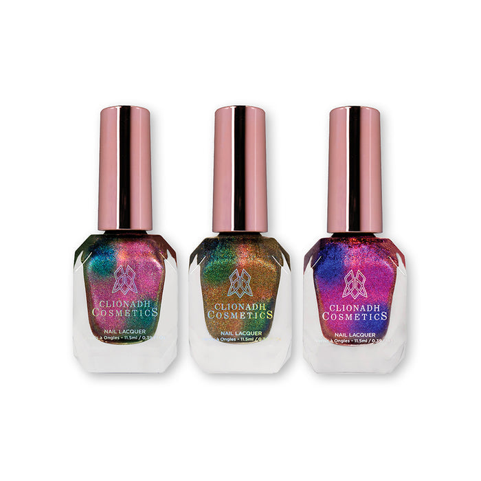 Three bottles of nail polish containing  the Psilo-Siblings Trio Nail Lacquer bottles on a white background.
