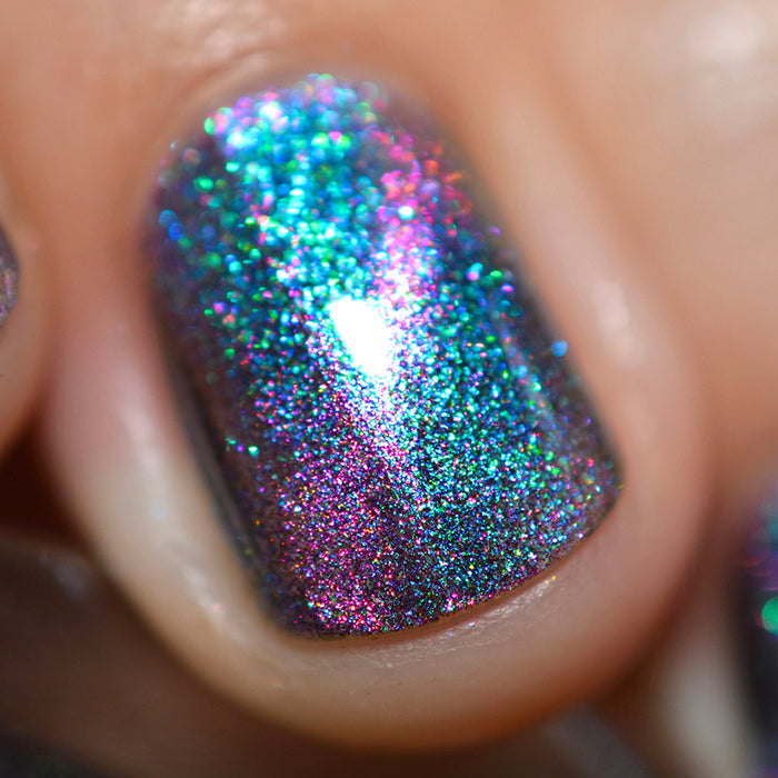 Close-up of one nail painted with Psilocin Nail Lacquer on fair skin tone.