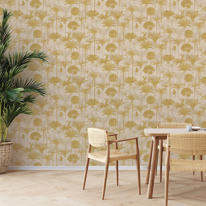 A wood table and plant in front of Tempaper's Royal Palm Peel And Stick Wallpaper.