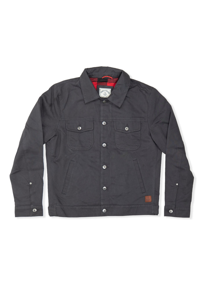 Dark gray jacket with button closure, two chest pockets, and red lining. Features a collar and subtle logo patch on the hem.