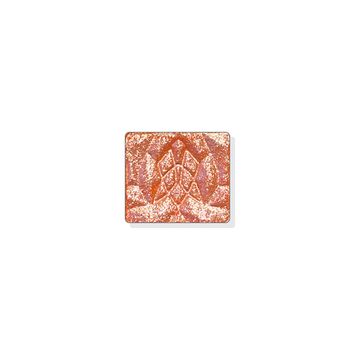 A single multichrome eyeshadow in colour Scroll on a white background. A creamy orange base with a bright, pearly pink-silver-aqua shift.