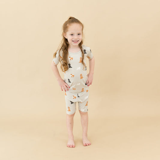 Child modeling Short Sleeve Pajamas in Fluffy Dog