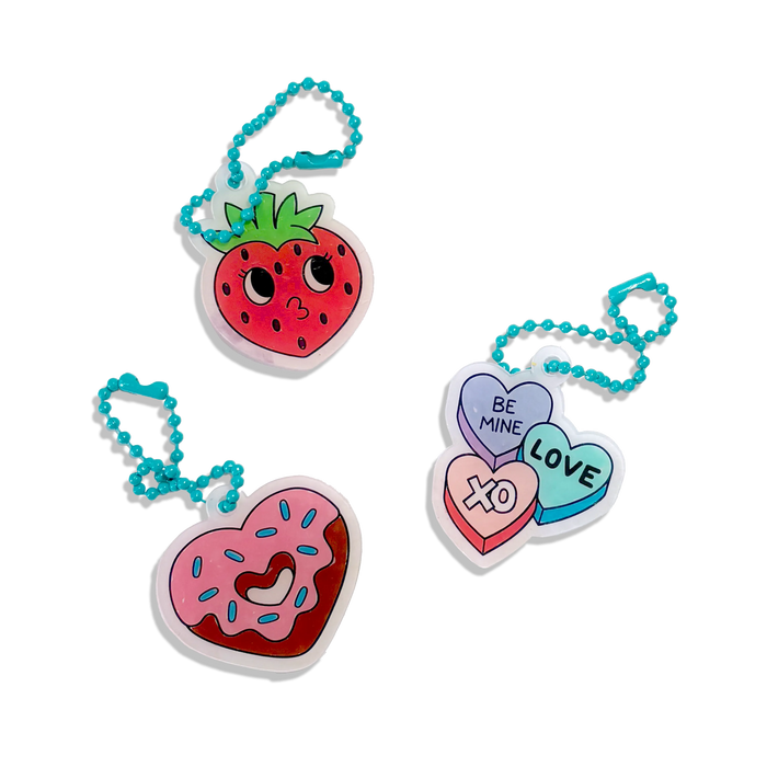 Colored charms with strawberry, hearts and donuts from OOLY Mini Shrink-Its! DIY Shrink Art Kit - Hugs & Kisses