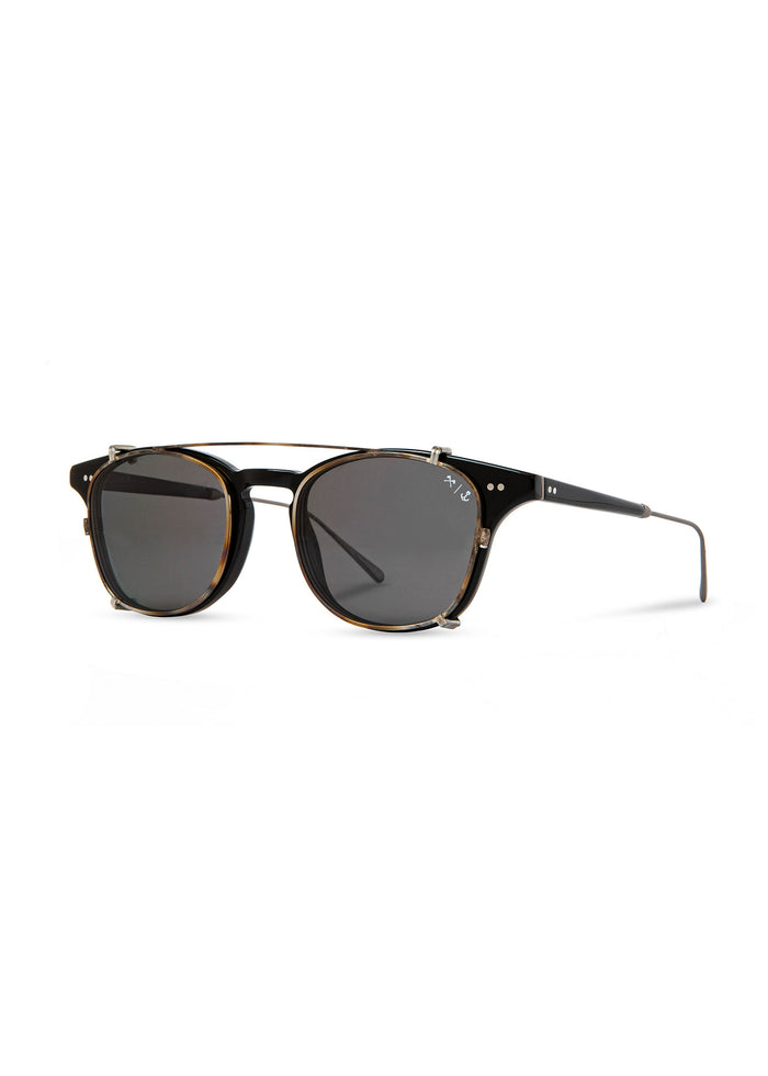 Stylish black sunglasses with round lenses and thin metal frame, featuring subtle design details on the temples and bridge.