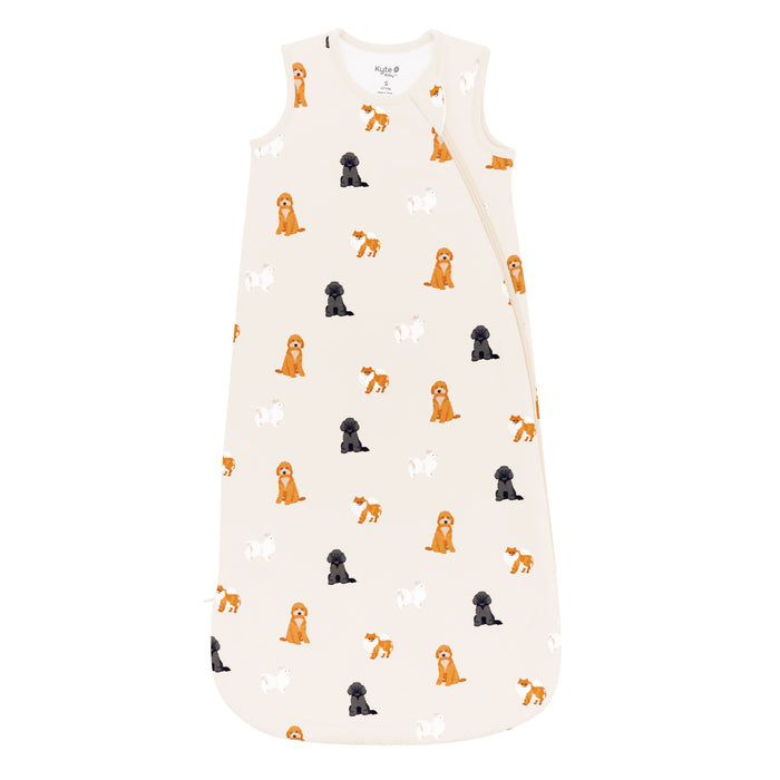Flat lay photo of Kyte Baby Sleep Bag in Fluffy Dog 1.0