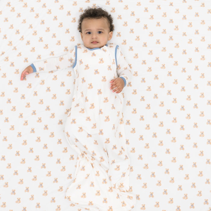 Baby wearing Sleep Bag in Teddy Bear 0.5 laying on a Teddy Bear blanket