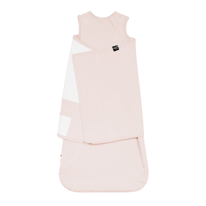 Sleep Bag Swaddler in Blush 0.5 shown swaddled
