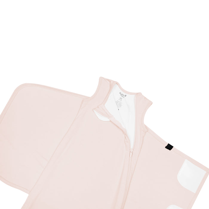 Zipper garage and top zipper on the Sleep Bag Swaddler in Blush 0.5