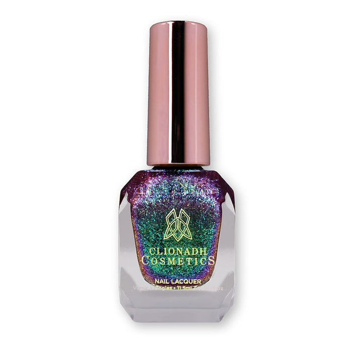 Bottle of nail polish containing Smedge Haze Nail Lacquer on white background.