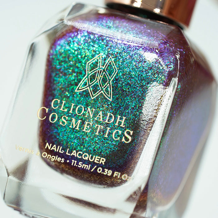 Close-up, angled shot of Smedge Haze Nail Lacquer bottle on a white background.