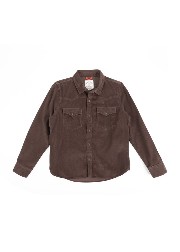 Brown corduroy shirt with button front and two chest pockets, laid flat on a white background, showcasing its casual style.
