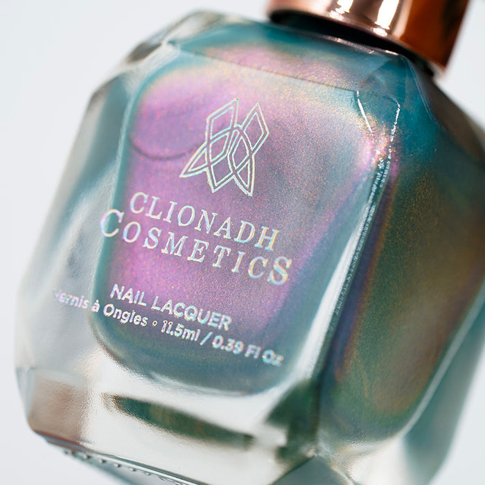 Macro shot of Statue Garden Nail Lacquer bottle.