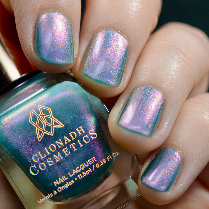 Close up shot of nails done with Statue Garden Nail Lacquer on fair skin tone.
