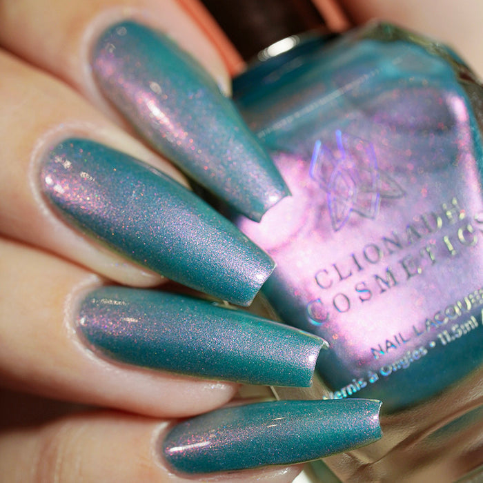 Close up shot of long nails done with Statue Garden Nail Lacquer on fair skin tone.