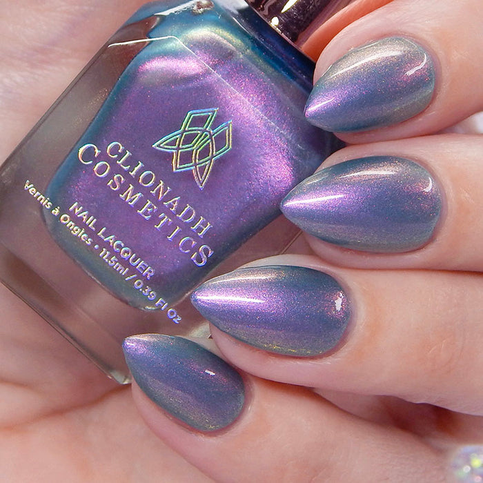 Close up shot of nails done with Statue Garden Nail Lacquer on fair skin tone.