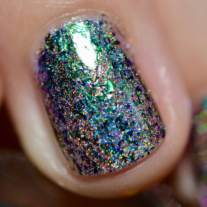 Close-up of one nail painted with Step on a Crack Nail Lacquer on fair skin tone.