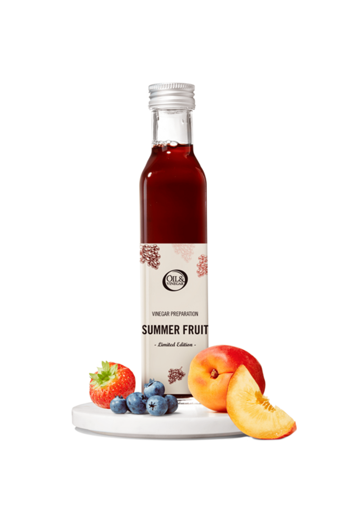 Bottle of 'Summer Fruit' vinegar with fruits