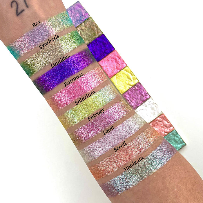Arm swatches of the Halloween Stained Glass Expansion Bundle shadows on fair skin tone.