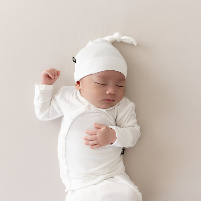 Sleeping Newborn in Take Me Home Set with Cap in Cloud