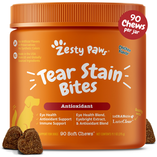 Orange jar of Zesty Paws Tear Stain Bites dog chews with chicken flavor, containing 90 soft chews.