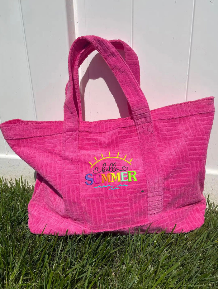 Pink terry cloth beach tote bag with hello summer embroidery from Travellers Hat Boutique