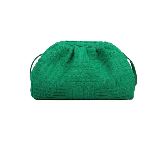 Green textured fabric clutch bag from Travellers Hat Boutique with a soft, gathered design